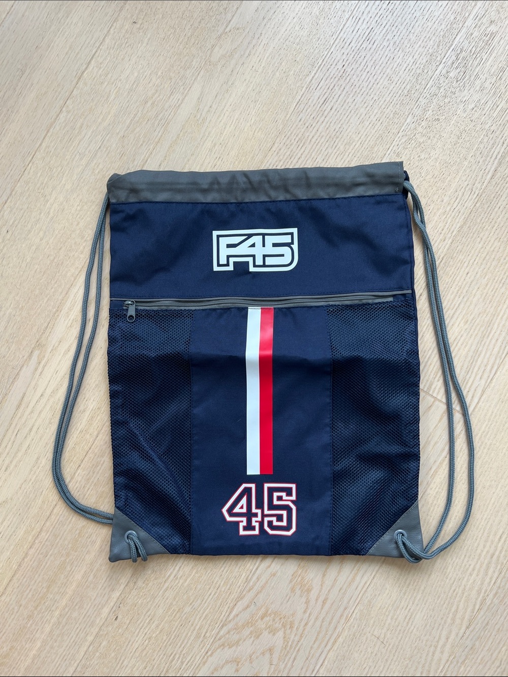 F45 Navy Drawstring Gym Bag with zippered pocket